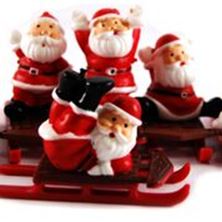 Picture of FATHER CHRISTMAS ON SLEIGH PLASTIC CAKE TOPPER5.7CM (2.25)